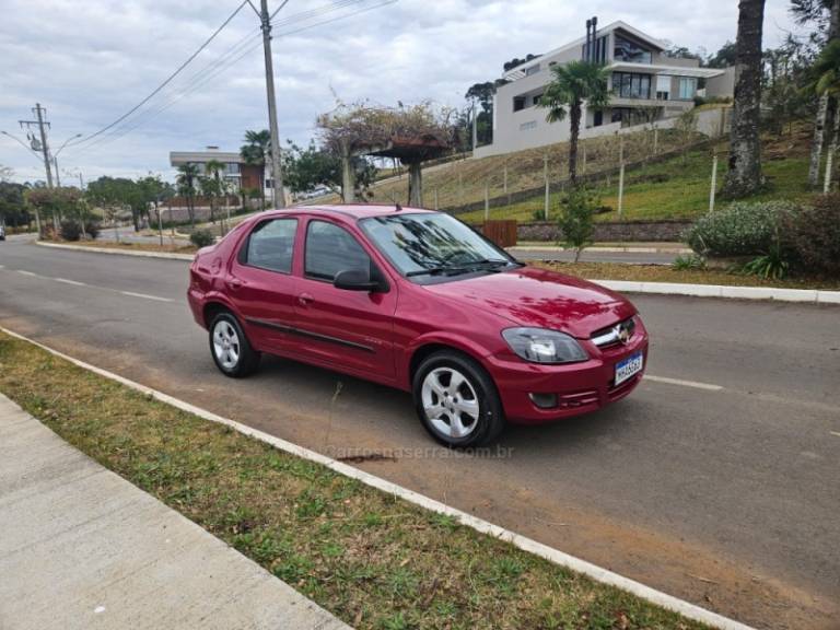 CHEVROLET - PRISMA - 2009/2009 - Vermelha - R$ 26.900,00