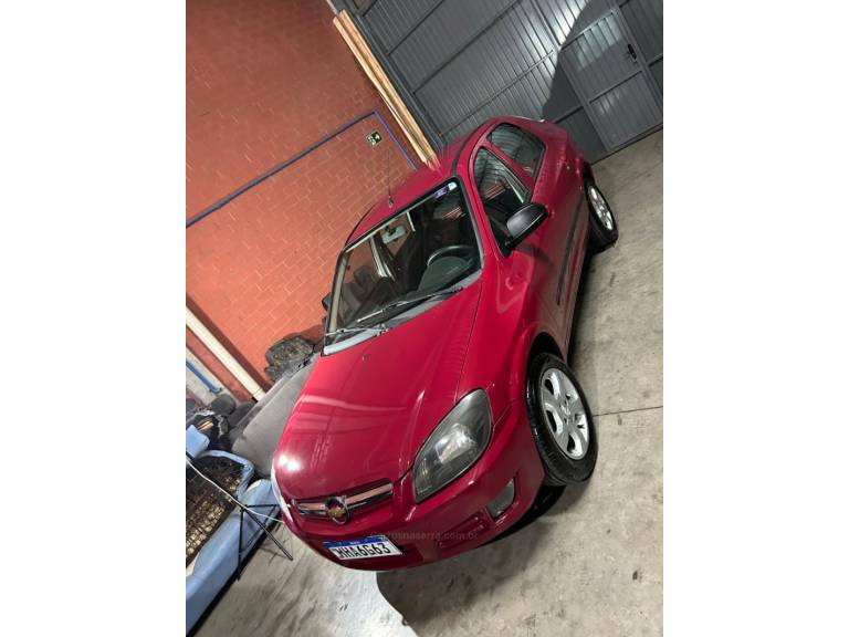 CHEVROLET - PRISMA - 2009/2009 - Vermelha - R$ 26.900,00