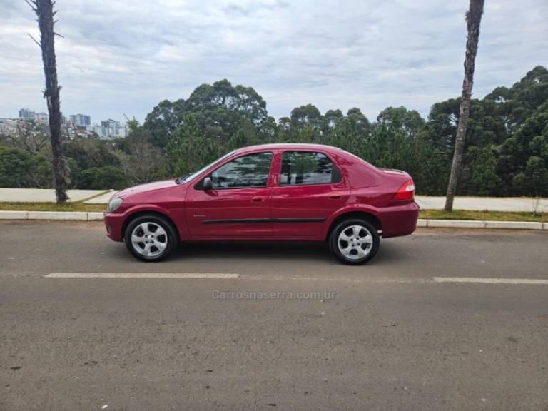 CHEVROLET - PRISMA - 2009/2009 - Vermelha - R$ 26.900,00